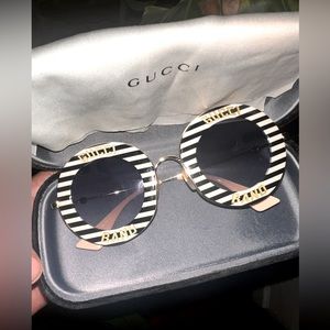 Gently worn authentic Gucci sunglasses, with original case and cloth.